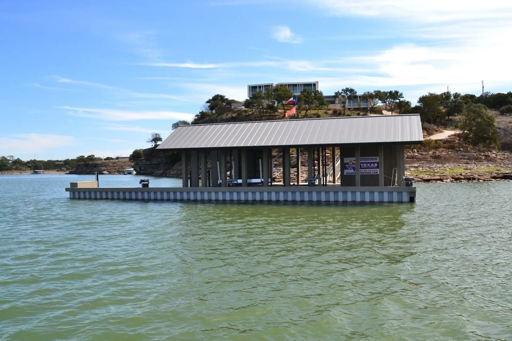 Texas Dock & Design craft work — a finished concrete-decked stationary dock